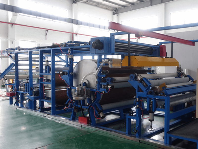 DSC00778SOLVENT BASED GLUE LAMINATION MACHINEeku